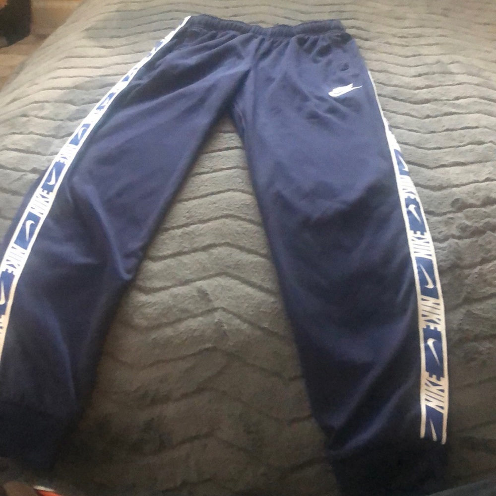 Nike Drifit dark blue jogging pants. Size Medium boys